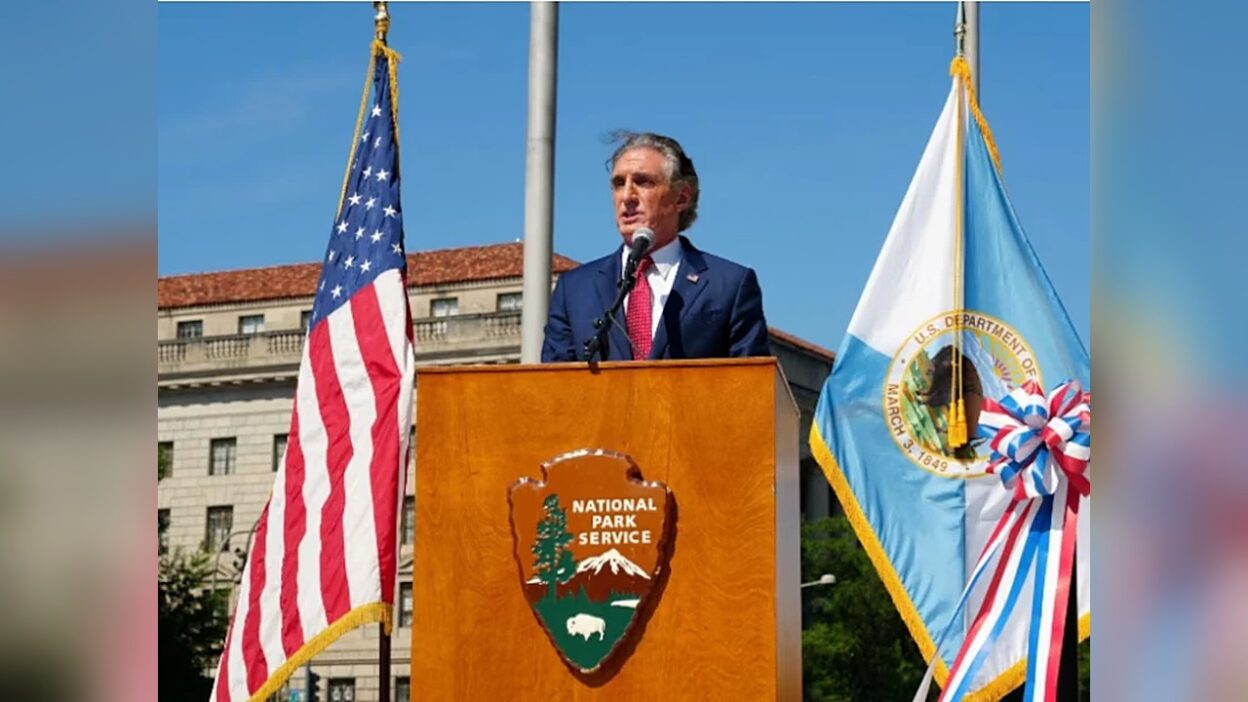 Interior Secretary Doug Burgum speaking at a podium